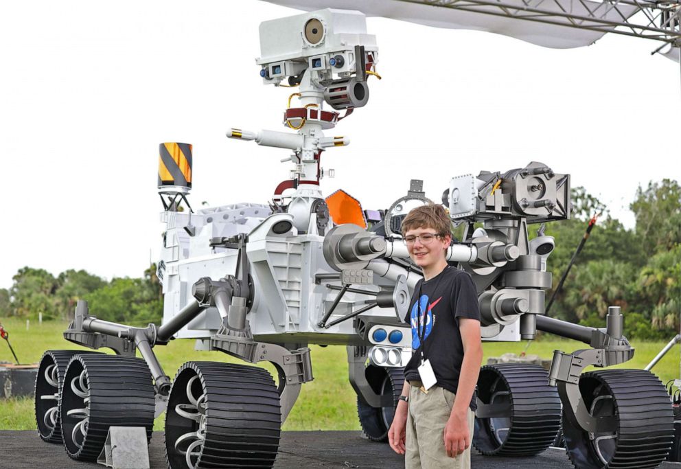 PHOTO: Thirteen-year-old Alex Mather speaks to the media in front of a mock-up of the Perseverance rover at Cape Canaveral Air Force Station in Florida on July 28, 2020. 