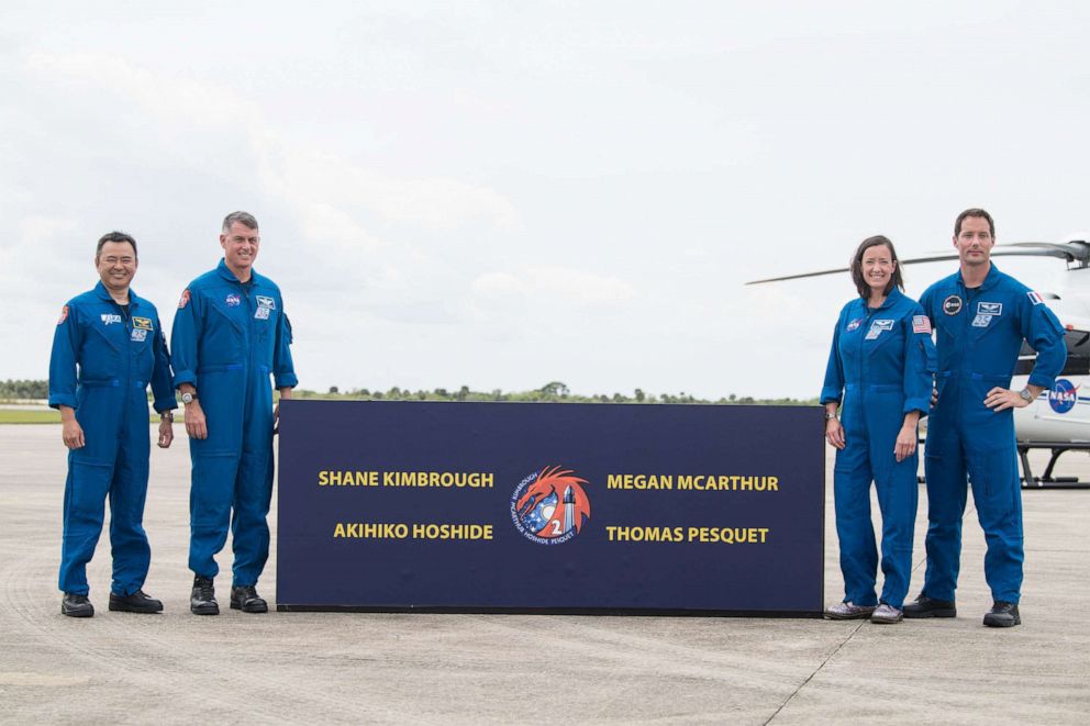 PHOTO: The SpaceX Crew 2 pose for a photo after arriving at the Launch and Landing Facility at NASA's Kennedy Space Center ahead of SpaceX's Crew-2 mission, on April 16, 2021, in Fla.