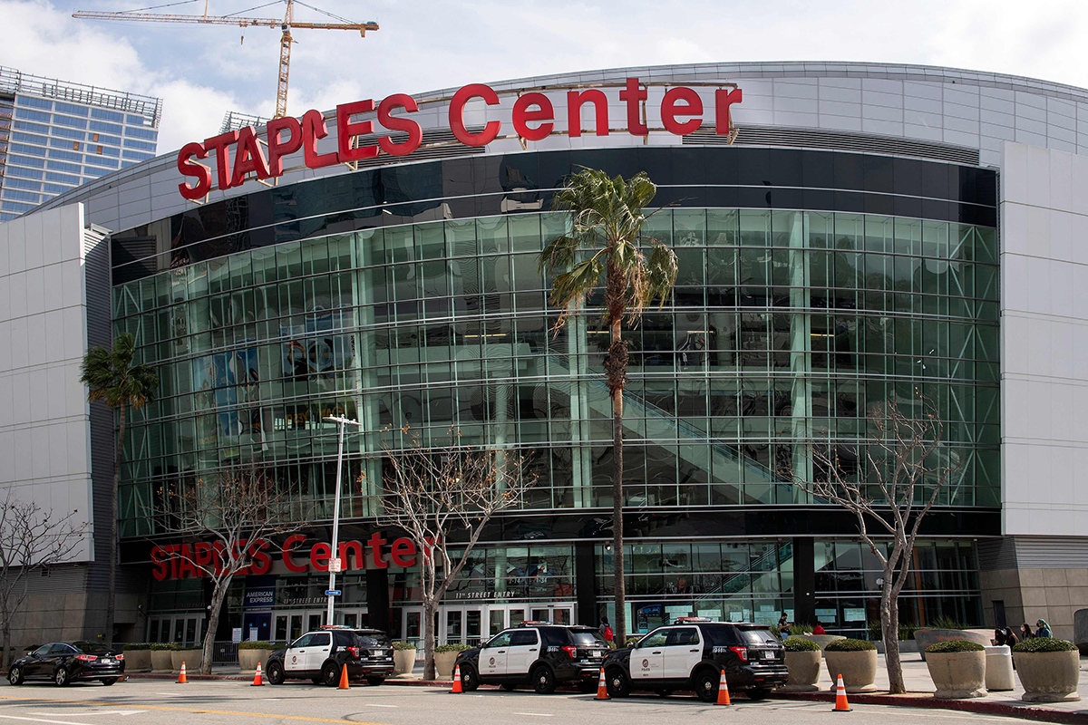 PHOTO: In this file photo taken on March 14, 2021 police cars are parked in front of the Staples Center where the 63rd Annual Grammy Awards are taking place in Los Angeles.