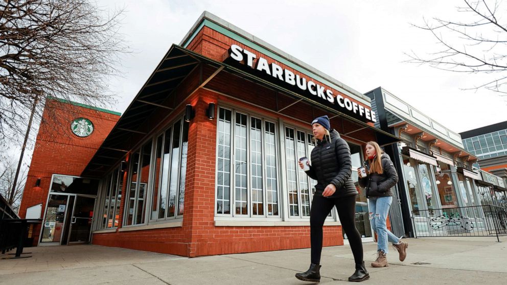 PHOTO: People walk past a Starbucks in Buffalo, New York, Dec. 7, 2021.