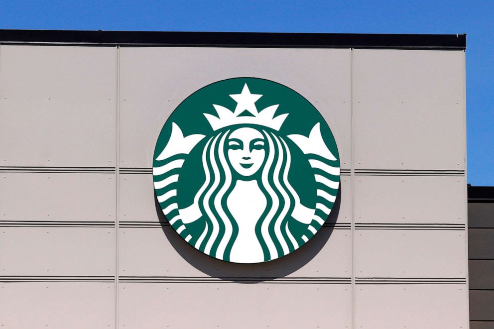 PHOTO: Starbucks coffee business logo on outside wall of one of their stores. 