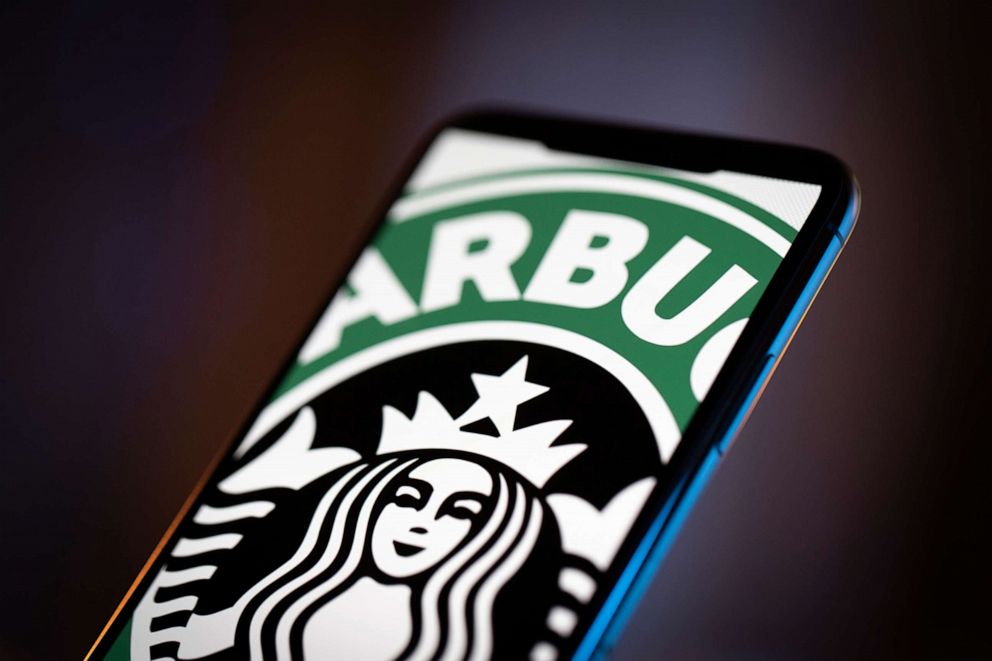 PHOTO: The Starbucks logo is seen on an iPhone, April 4, 2020.