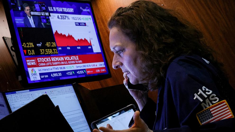 PHOTO: A trader works on the floor at the New York Stock Exchange (NYSE) in New York City, April 9, 2025.
