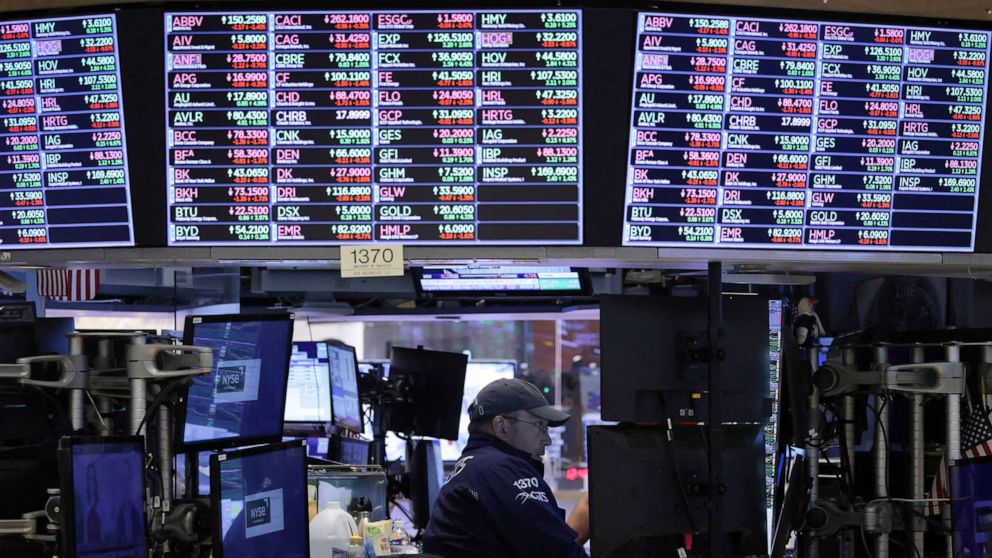 PHOTO: A trader works on the trading floor at the New York Stock Exchange, on May 19, 2022, in New York.