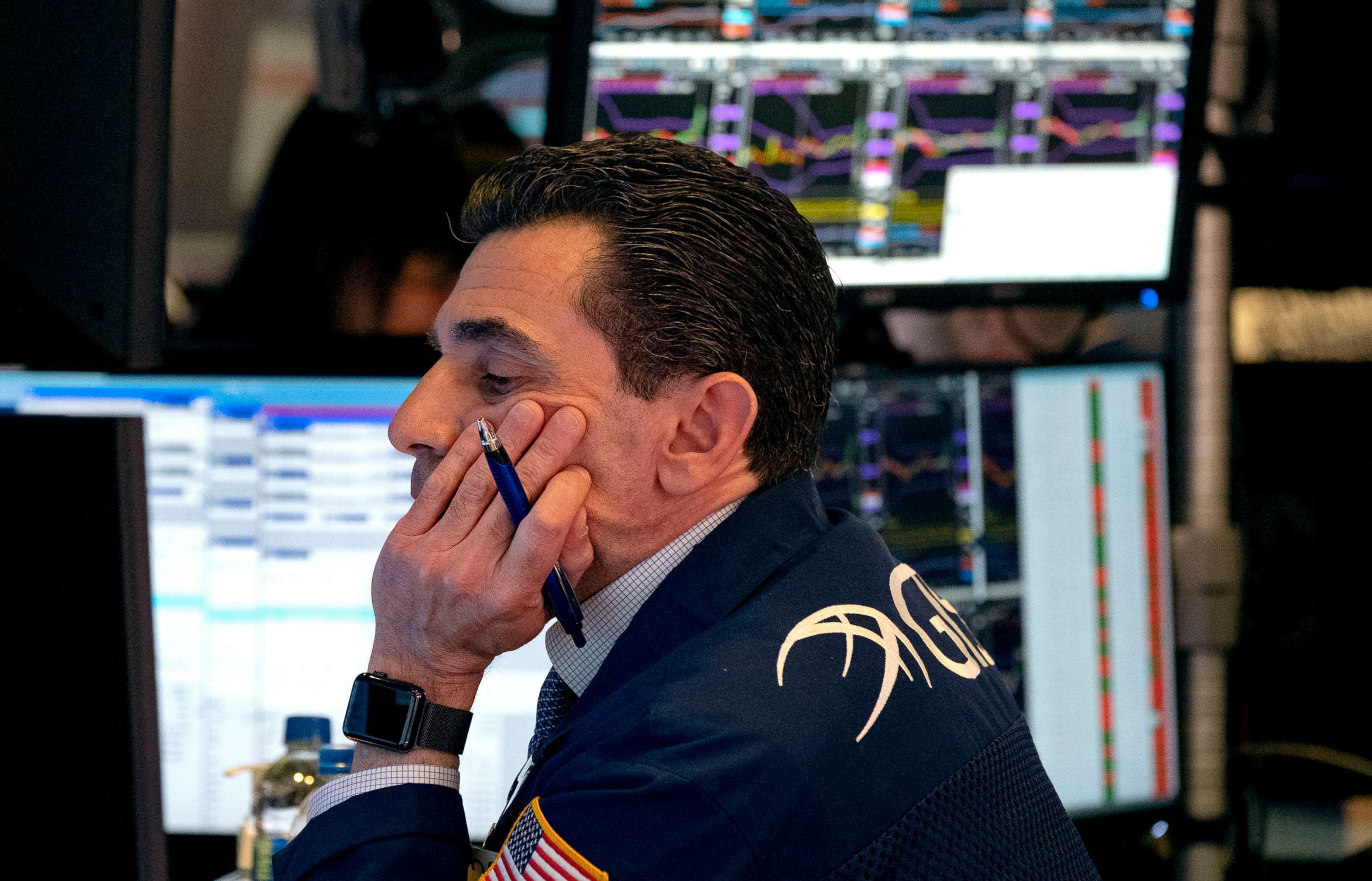 PHOTO: Trader Peter Mazza works on the floor of the New York Stock Exchange, March 16, 2020.