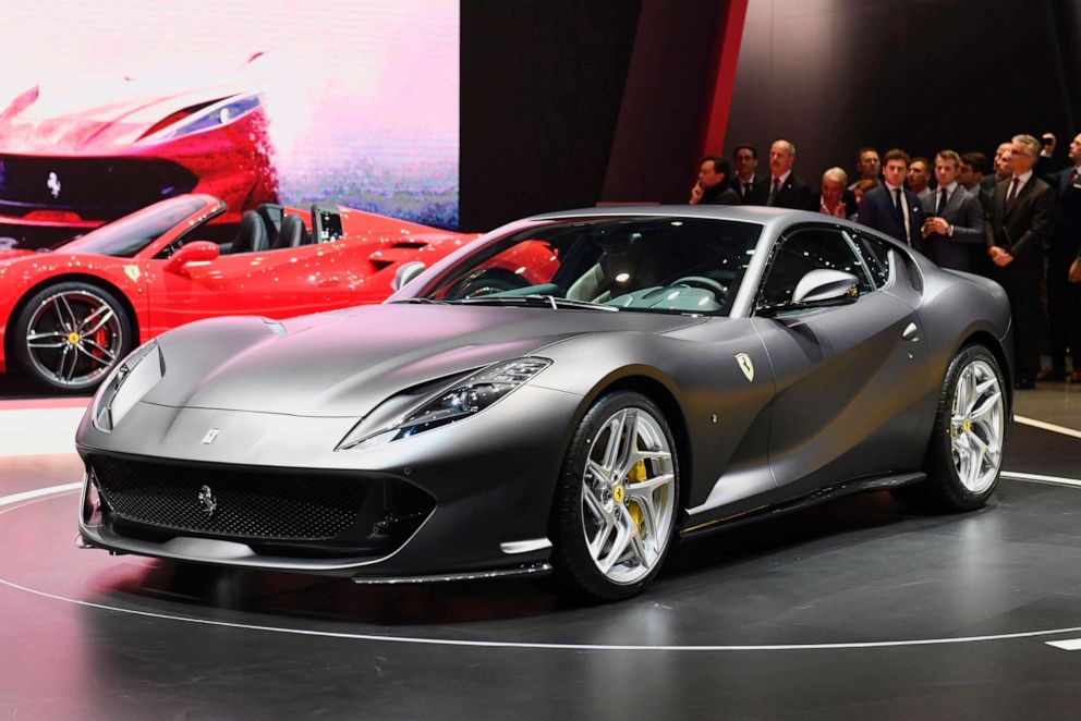 PHOTO: People look at the Ferrari 812 Superfast during the Geneva International Motor Show, March 7, 2017 in Geneva.