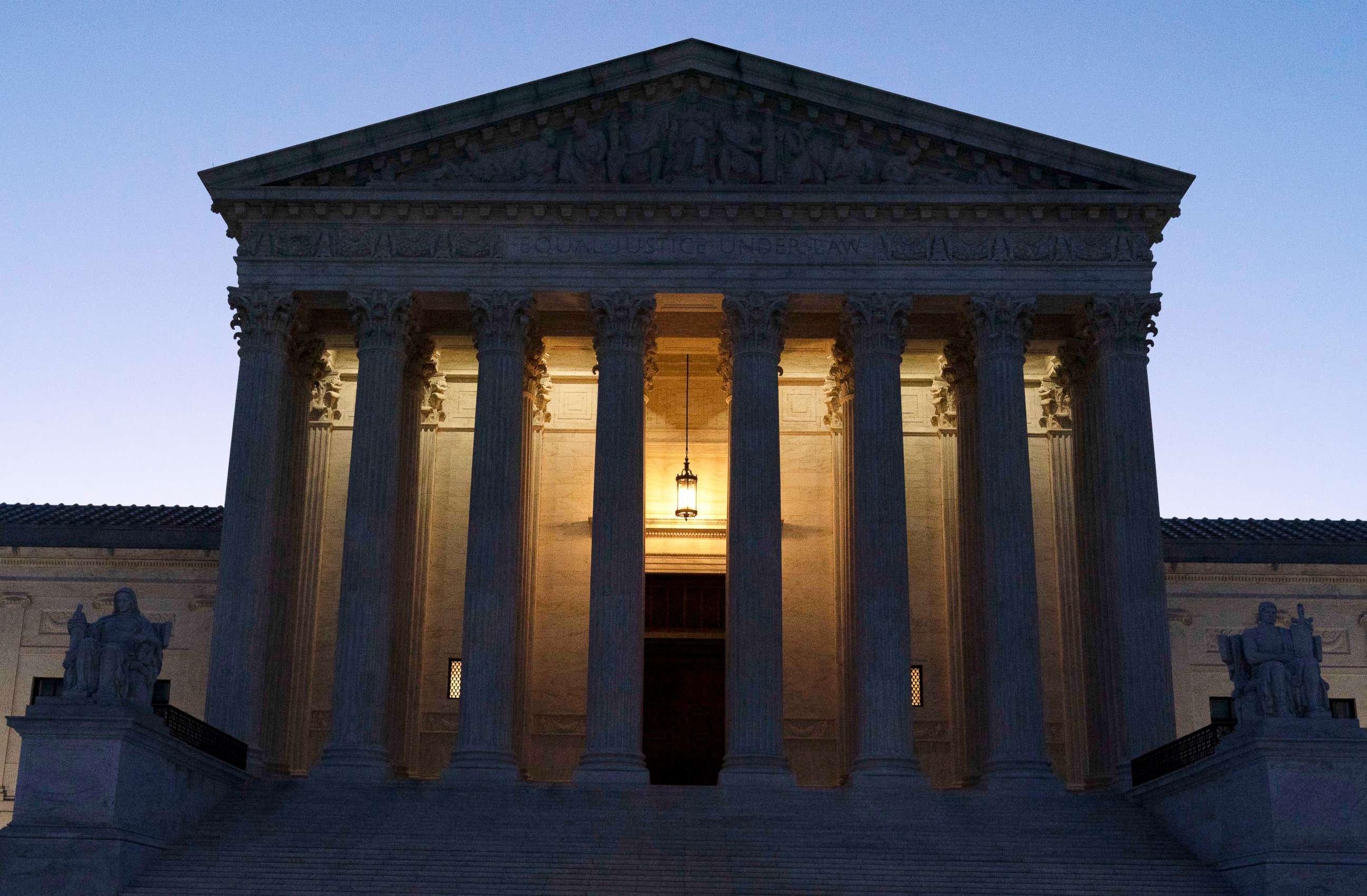 PHOTO: The U.S. Supreme Court is seen before sunrise on Capitol Hill in Washington, March 21, 2022.