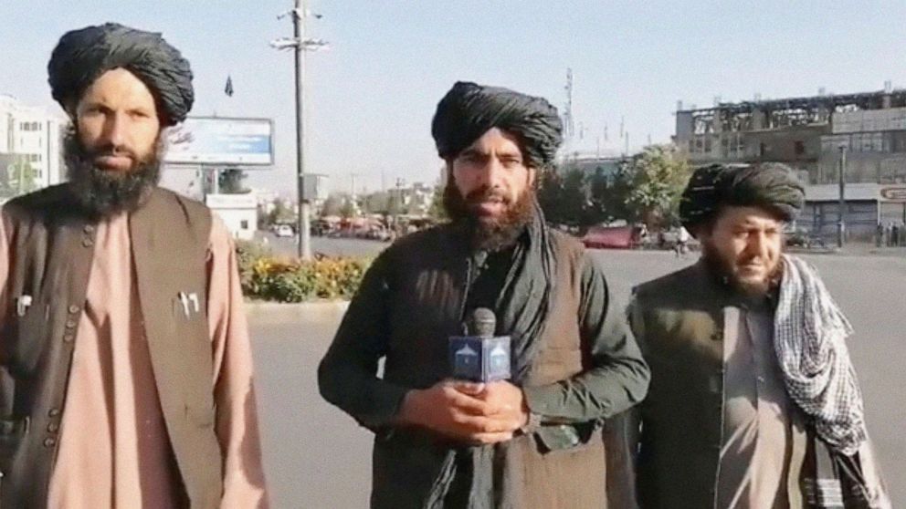 PHOTO: A man, who purportedly is a Taliban militant, holds a wireless microphone as he speaks on the street in Kabul, Afghanistan, in this still image taken from social media video uploaded Aug. 16, 2021 , and supplied by a third party.