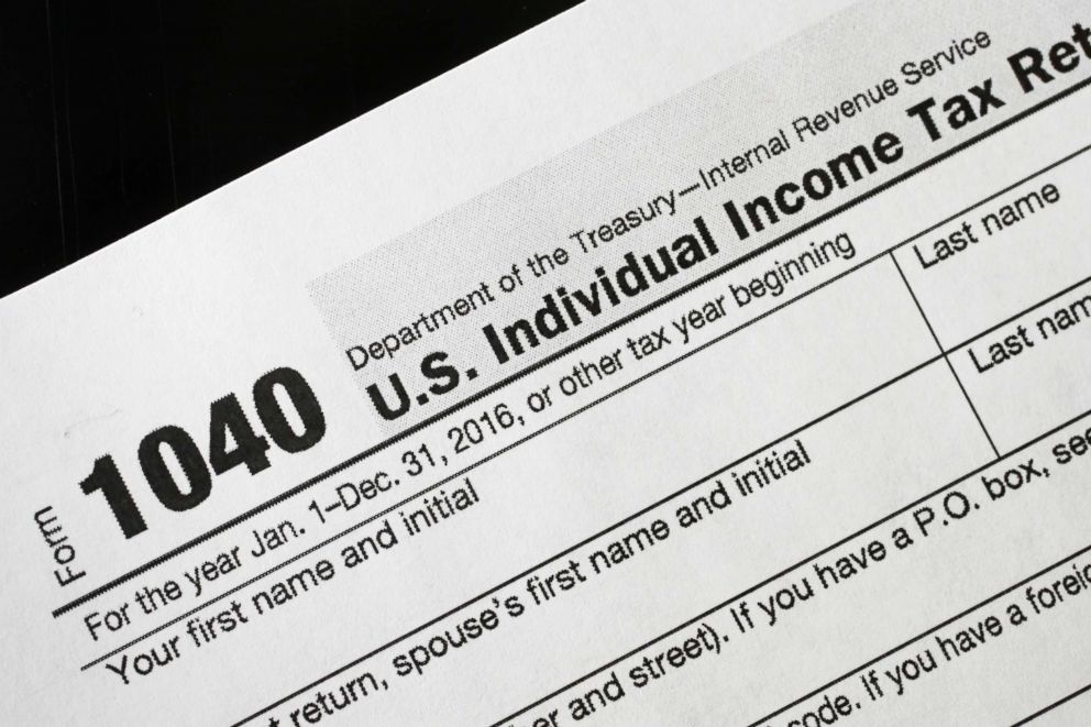PHOTO: In this Jan. 10, 2017 file photo, a 1040 tax form appears on display in New York.  