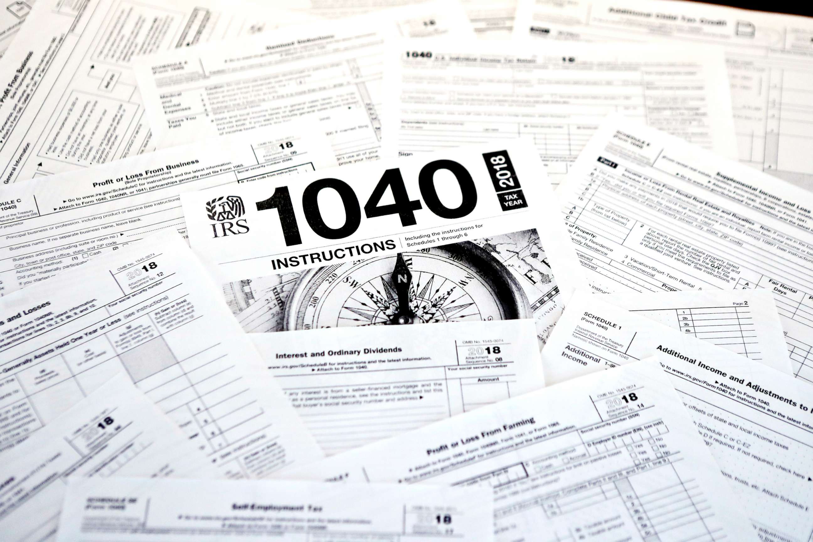PHOTO: This Feb. 13, 2019, photo shows multiple forms printed from the Internal Revenue Service web page that are used for 2018 U.S. federal tax returns in Zelienople, Pa.