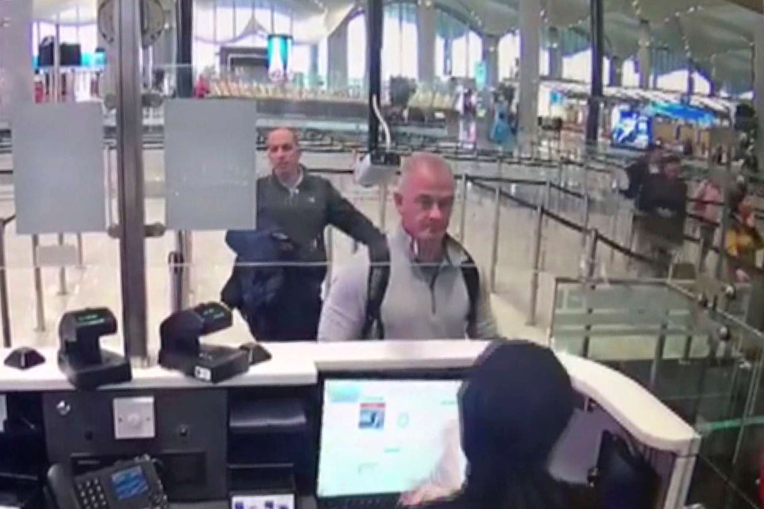 PHOTO:This Dec. 30, 2019 image from security camera video shows Michael L. Taylor, center, and George-Antoine Zayek at passport control at Istanbul Airport in Turkey. 