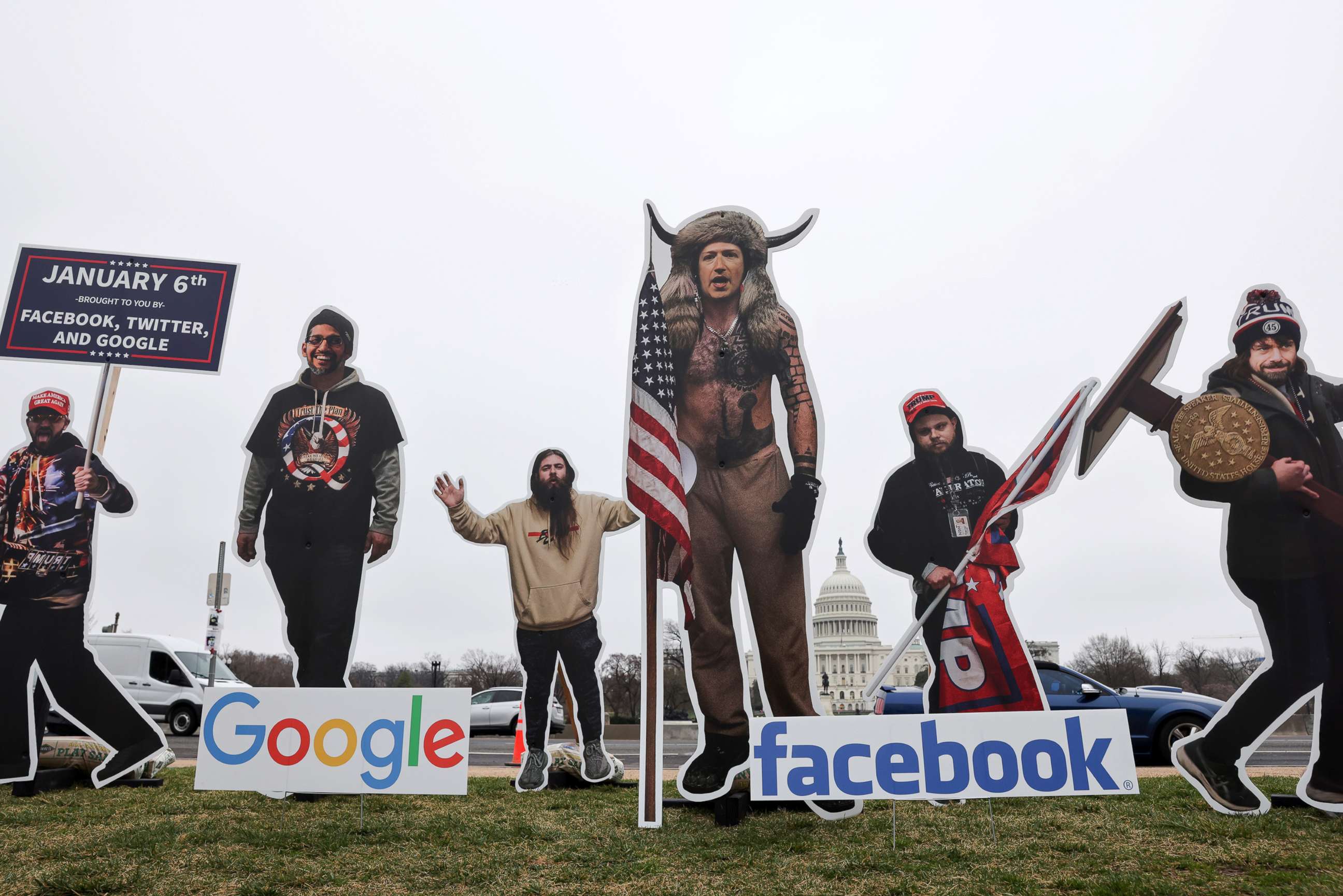 PHOTO: An art installation protest portrays Google CEO Sundar Pichai, Twitter CEO Jack Dorsey and Facebook CEO Mark Zuckerberg as January 6th rioters on the National Mall near the U.S. Capitol in Washington, D.C., March 25, 2021.