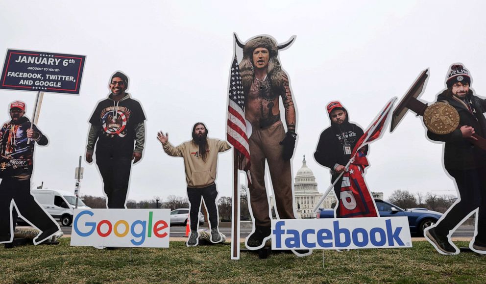 PHOTO: An art installation protest portrays Google CEO Sundar Pichai, Twitter CEO Jack Dorsey and Facebook CEO Mark Zuckerberg as January 6th rioters on the National Mall near the U.S. Capitol in Washington, D.C., March 25, 2021.