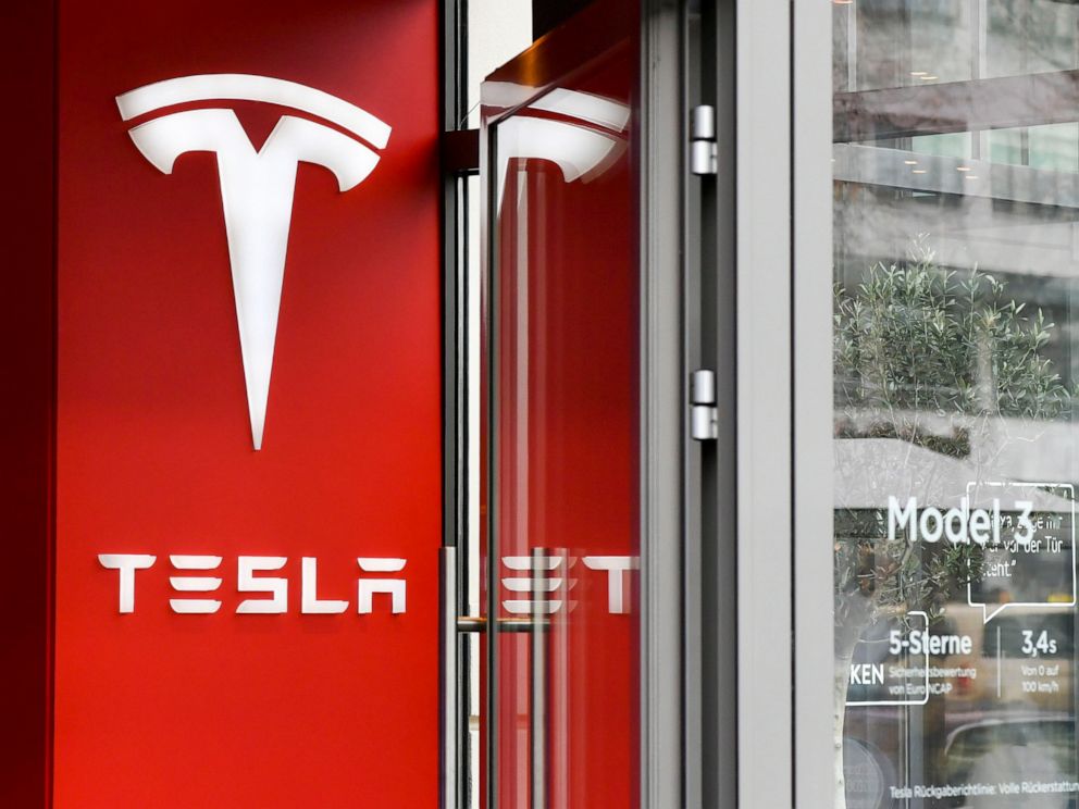 PHOTO: In this Jan. 27, 2020, file photo, the logo of the electric car manufacturer Tesla is shown at a Tesla store in Berlin.
