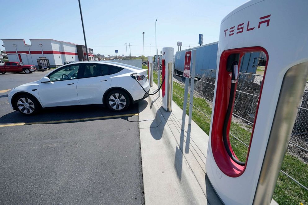 PHOTO: A Tesla charges at a station in Topeka, Kan., April 5, 2021.