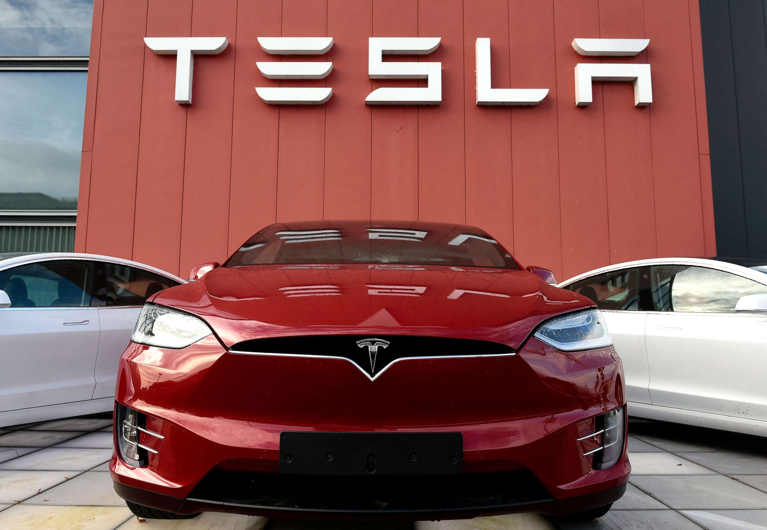 PHOTO: In this file photo taken on Oct. 23, 2019, the logo marks the showroom and service center for the US automotive and energy company Tesla in Amsterdam.