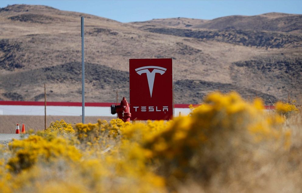 PHOTO: In this Oct. 13, 2018, file photo, a sign marks the entrance to the Tesla Gigafactory in Sparks, Nev.