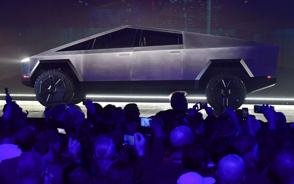 PHOTO:People take pictures of the newly unveiled all-electric battery-powered Tesla's Cybertruck at Tesla Design Center in Hawthorne, Calif., Nov. 21, 2019.