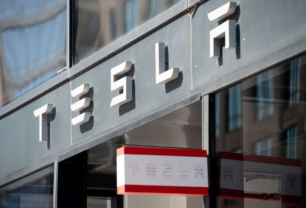PHOTO:In this file photo taken on Aug. 8, 2018 the Tesla logo is seen outside of their showroom in Washington, D.C.