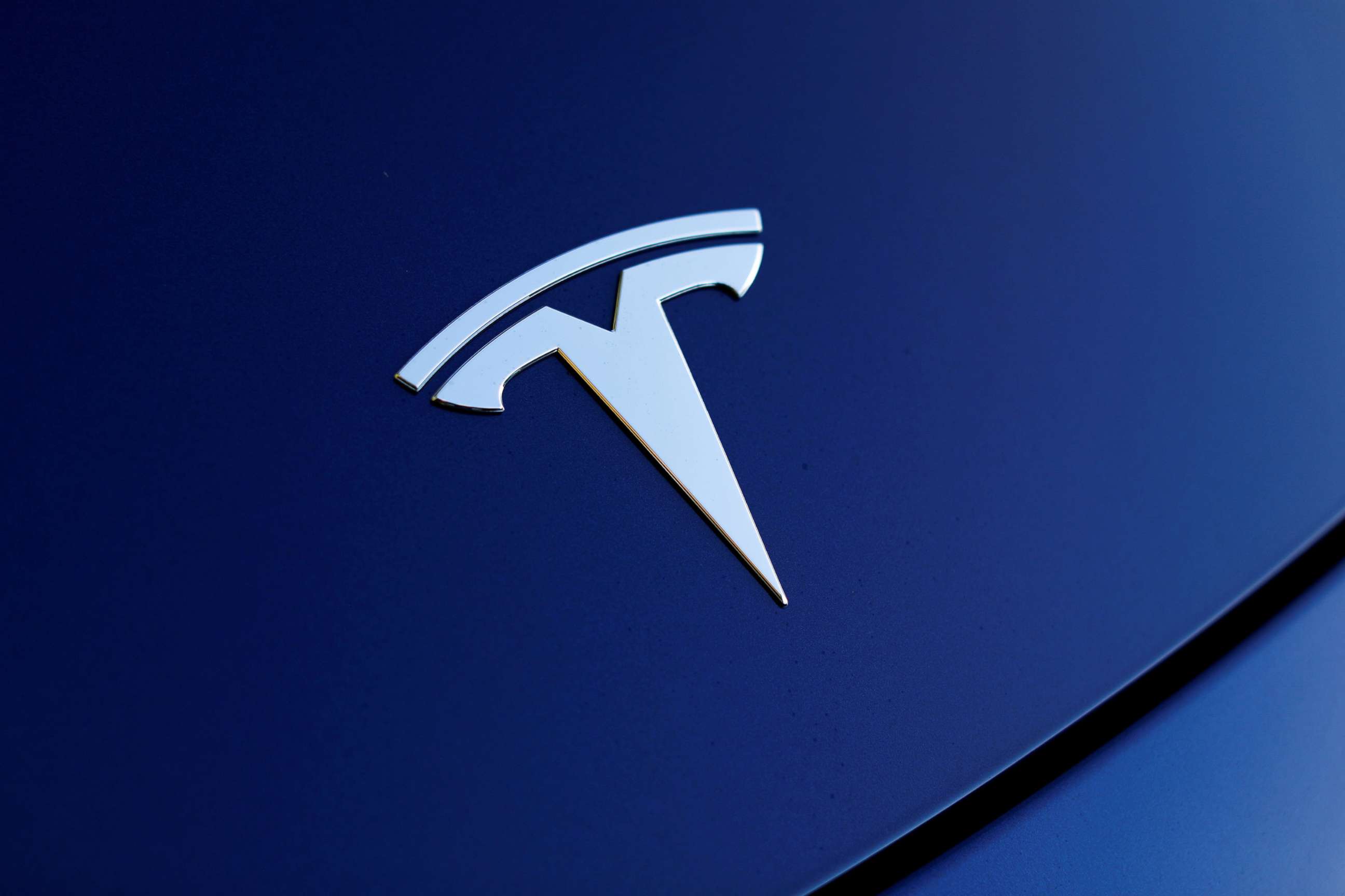 PHOTO: The front hood logo on a 2018 Tesla Model 3 electric vehicle is shown in this photo illustration taken in Cardiff, Calif., June 1, 2018.