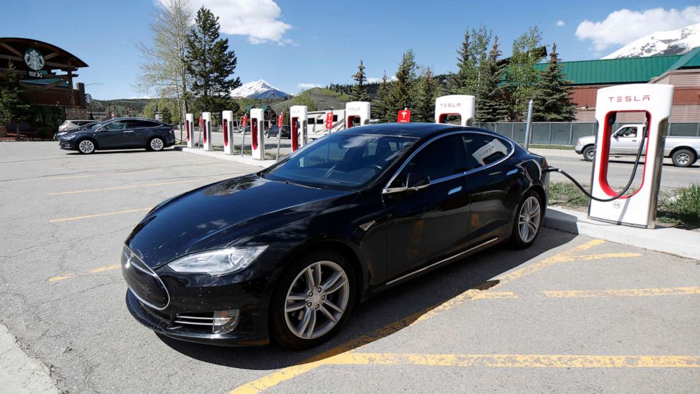 PHOTO: A Tesla Model S sedan charges at a supercharging station in Silverthorne, Colo. on June 8, 2019.