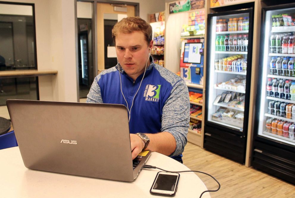 PHOTO: Tony Danna, vice president of international development at Three Square Market, works on his laptop in a company break room at its headquarters, Tuesday, July 25, 2017 in River Falls, Wis.