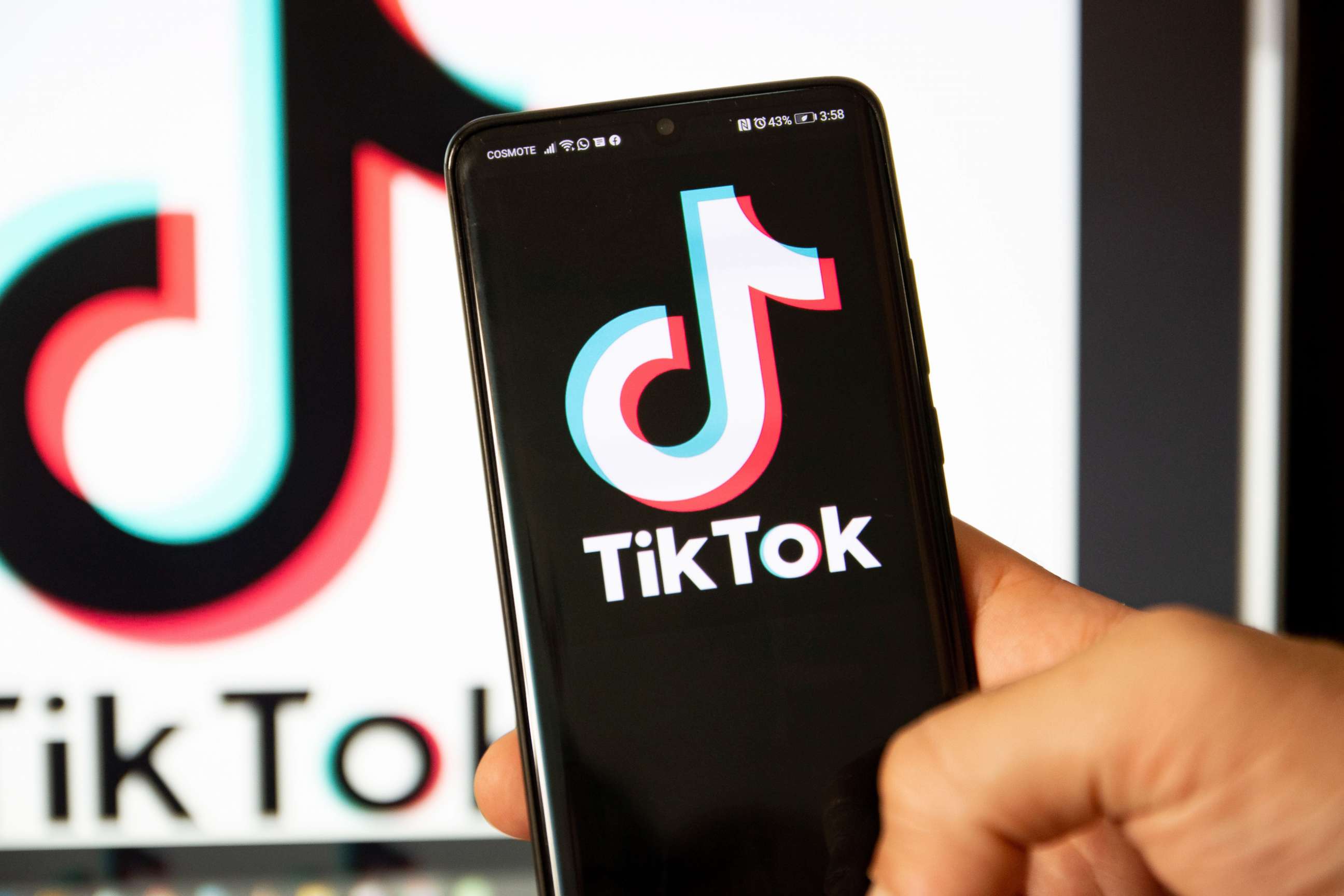 PHOTO: TikTok logo displayed on a phone screen.
