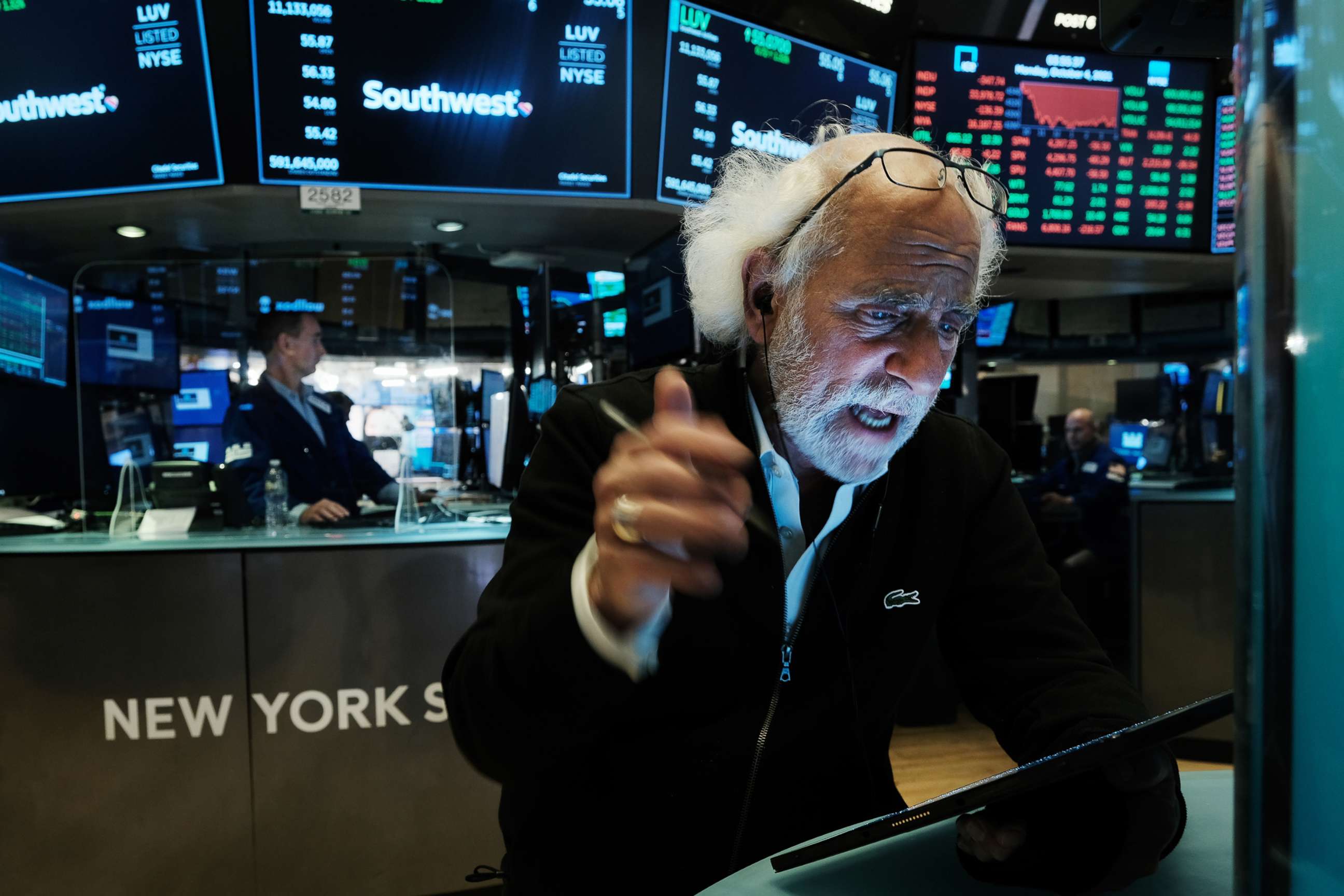 PHOTO: Traders work on the floor of the New York Stock Exchange (NYSE) on Oct. 4, 2021 in New York City.