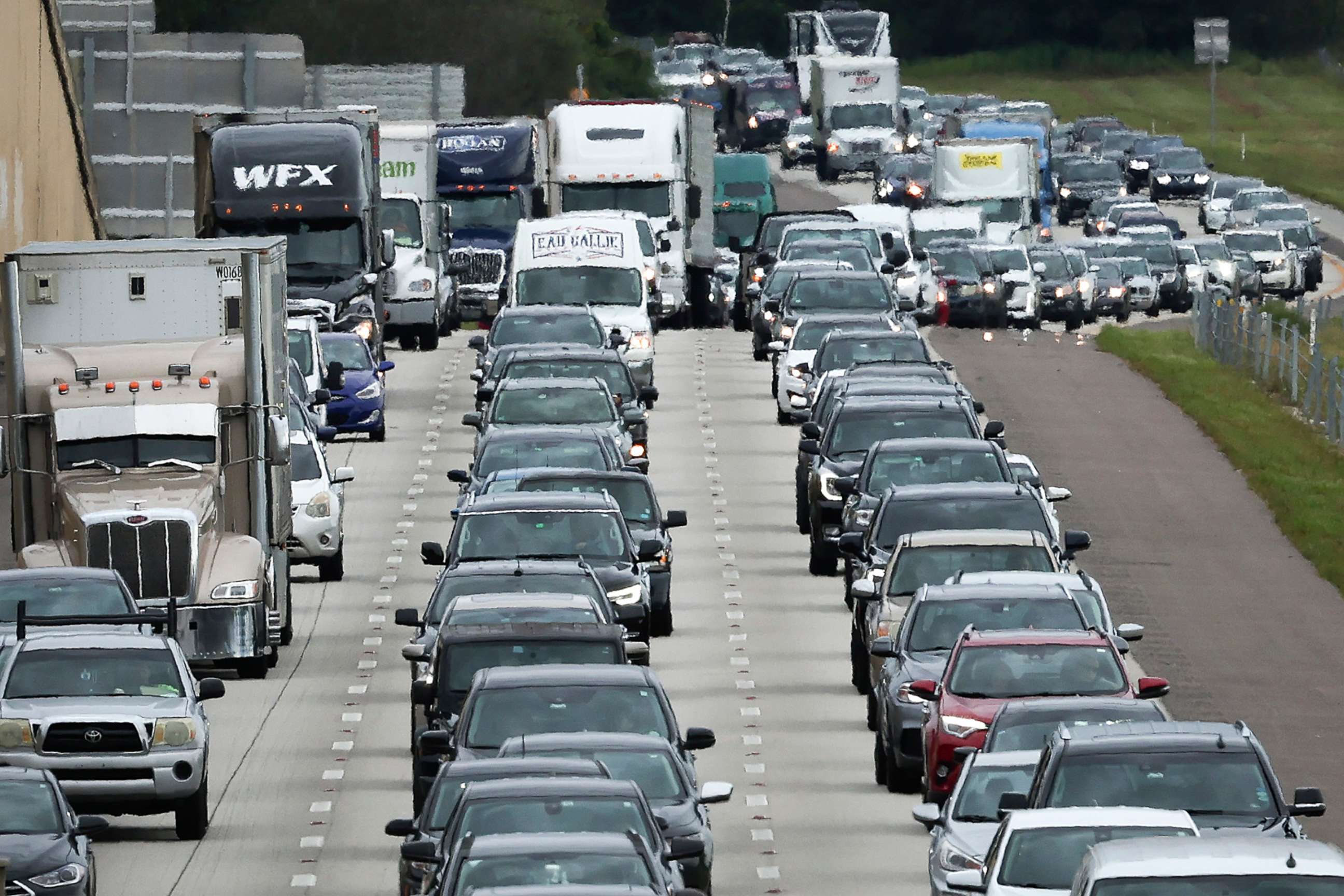 PHOTO: Heavy traffic moves slowly on I-4 East as residents evacuate the Gulf Coast of Florida in advance of the arrival of Hurricane Ian, Sept. 27, 2022, in Four Corners, Fla. 