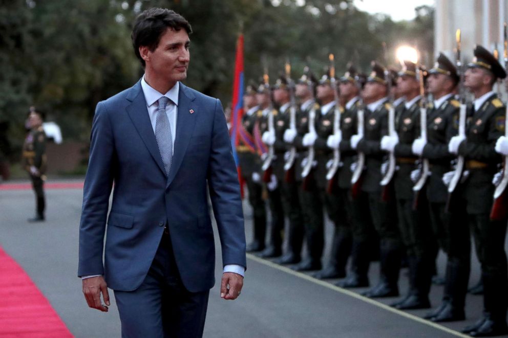 PHOTO: Canadian Prime Minister Justin Trudeau reviews the honor guard at a welcoming ceremony in Yerevan, Armenia, Oct. 12, 2018. 
