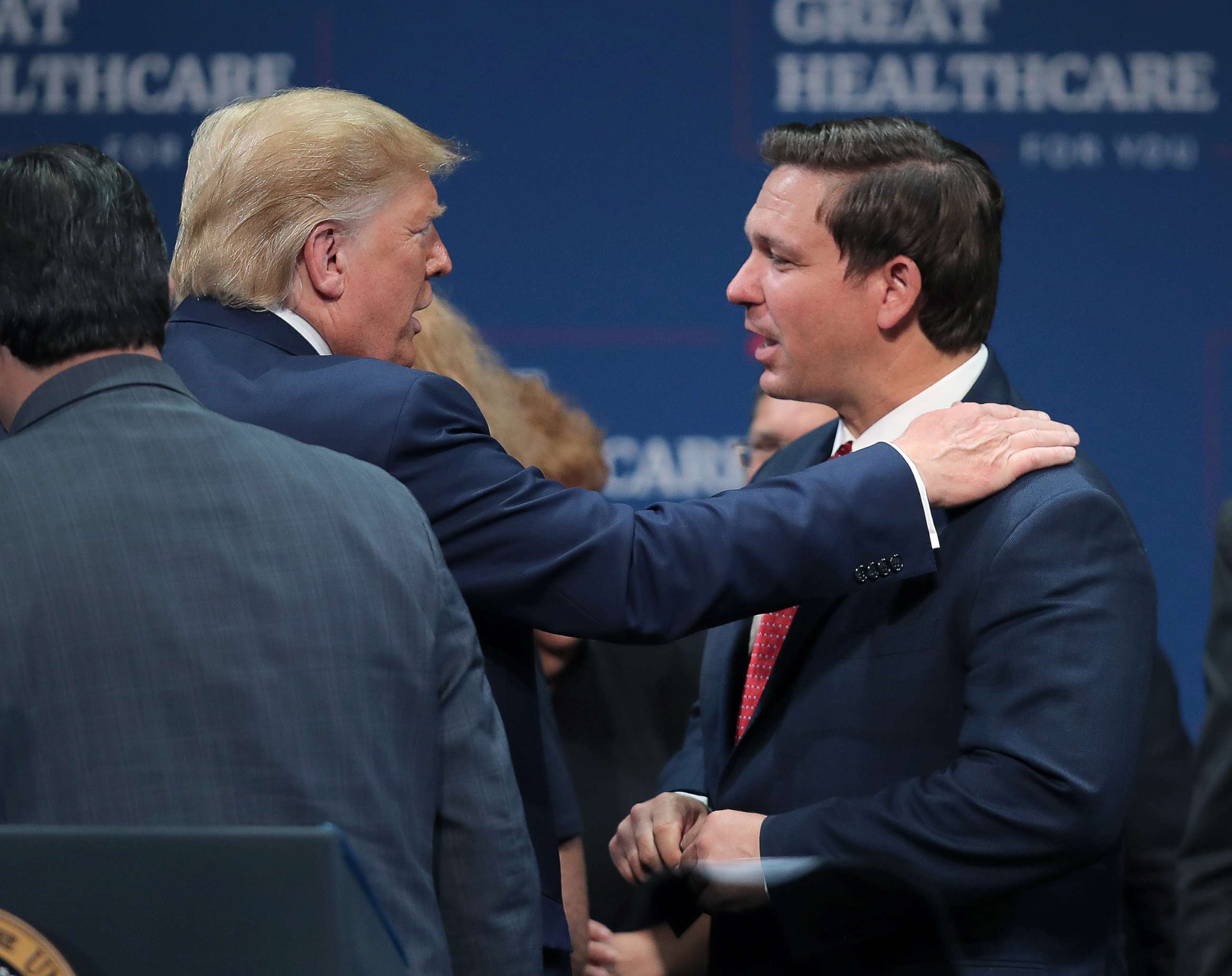 PHOTO: President Donald Trump speaks with Florida Gov. Ron DeSantis during an event, Oct. 3, 2019, in The Villages, Fla.