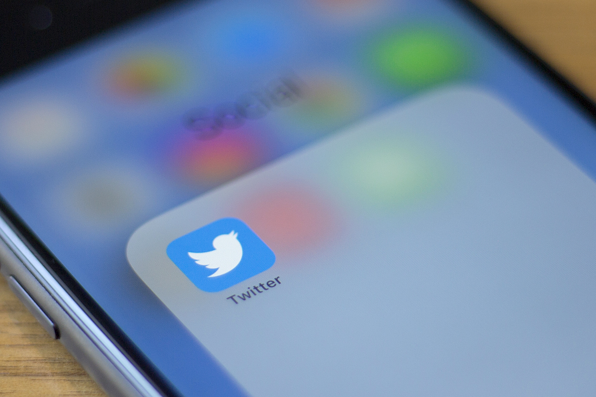 PHOTO: The Twitter logo is seen on a phone in this photo illustration in Washington, DC, on July 10, 2019.
