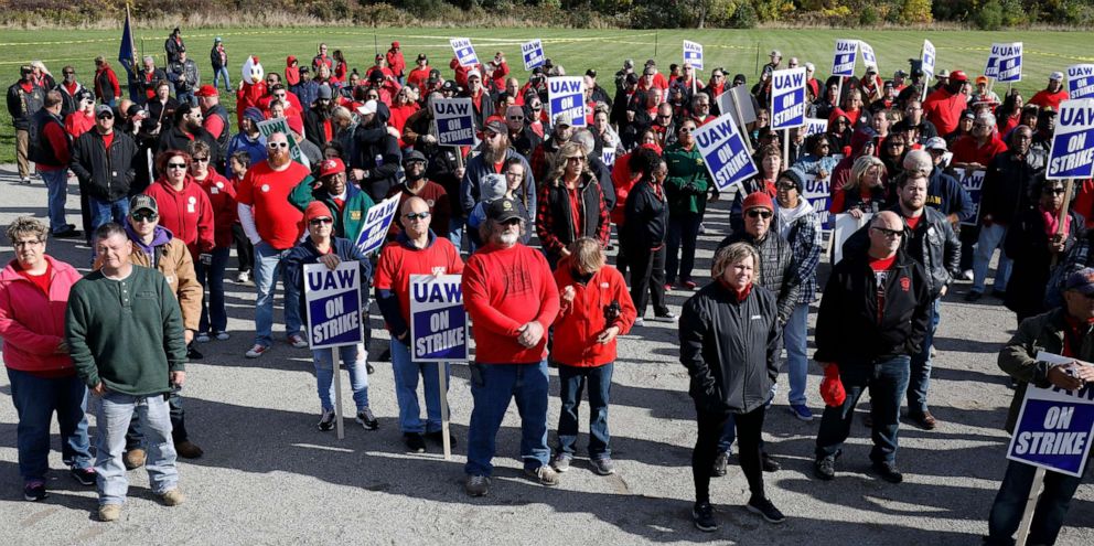 PHOTO: United Auto Workers union members and their families rally near the General Motors Flint Assembly plant on Solidarity Sunday on Oct. 13, 2019, in Flint, Michigan.