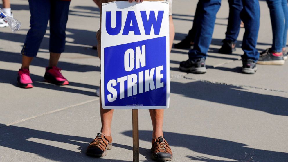 PHOTO: A striking worker holds a sign outside the shuttered General Motors Lordstown Assembly plant during the United Auto Workers national strike in Lordstown, Ohio, Sept. 20, 2019.