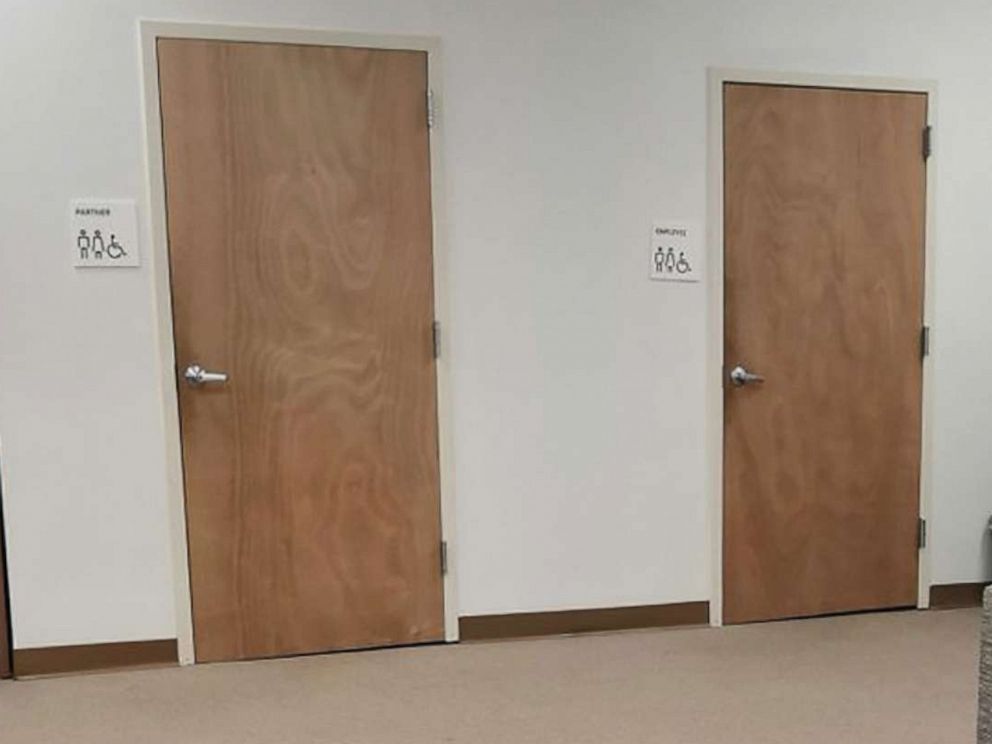 PHOTO: An Uber Greenlight Hub office in Providence, R.I., where bathroom signs read "Employee" and "Partner."