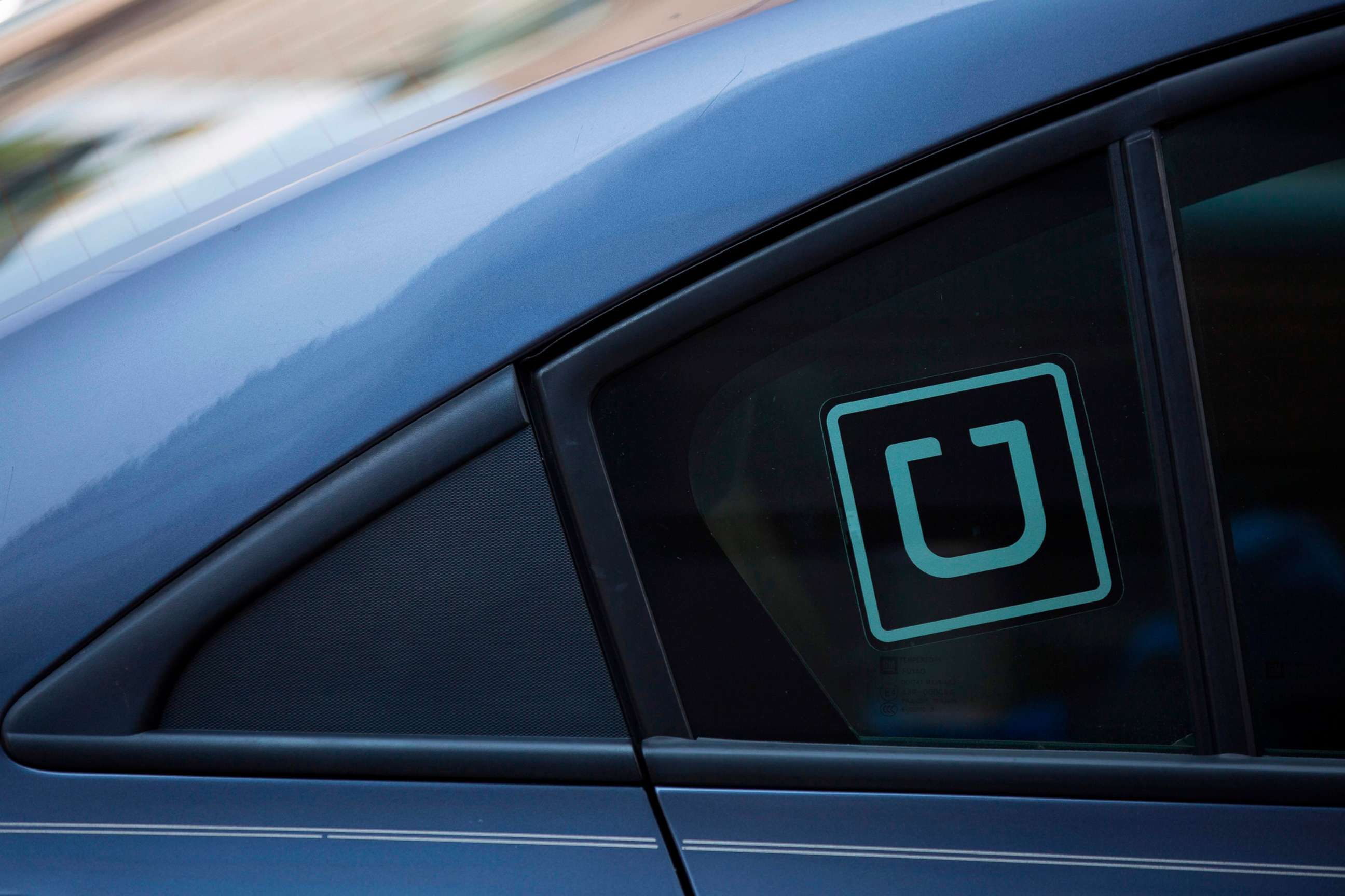 PHOTO: In this file photo taken on July 09, 2019, the Uber logo is seen on a car in Washington, D.C.