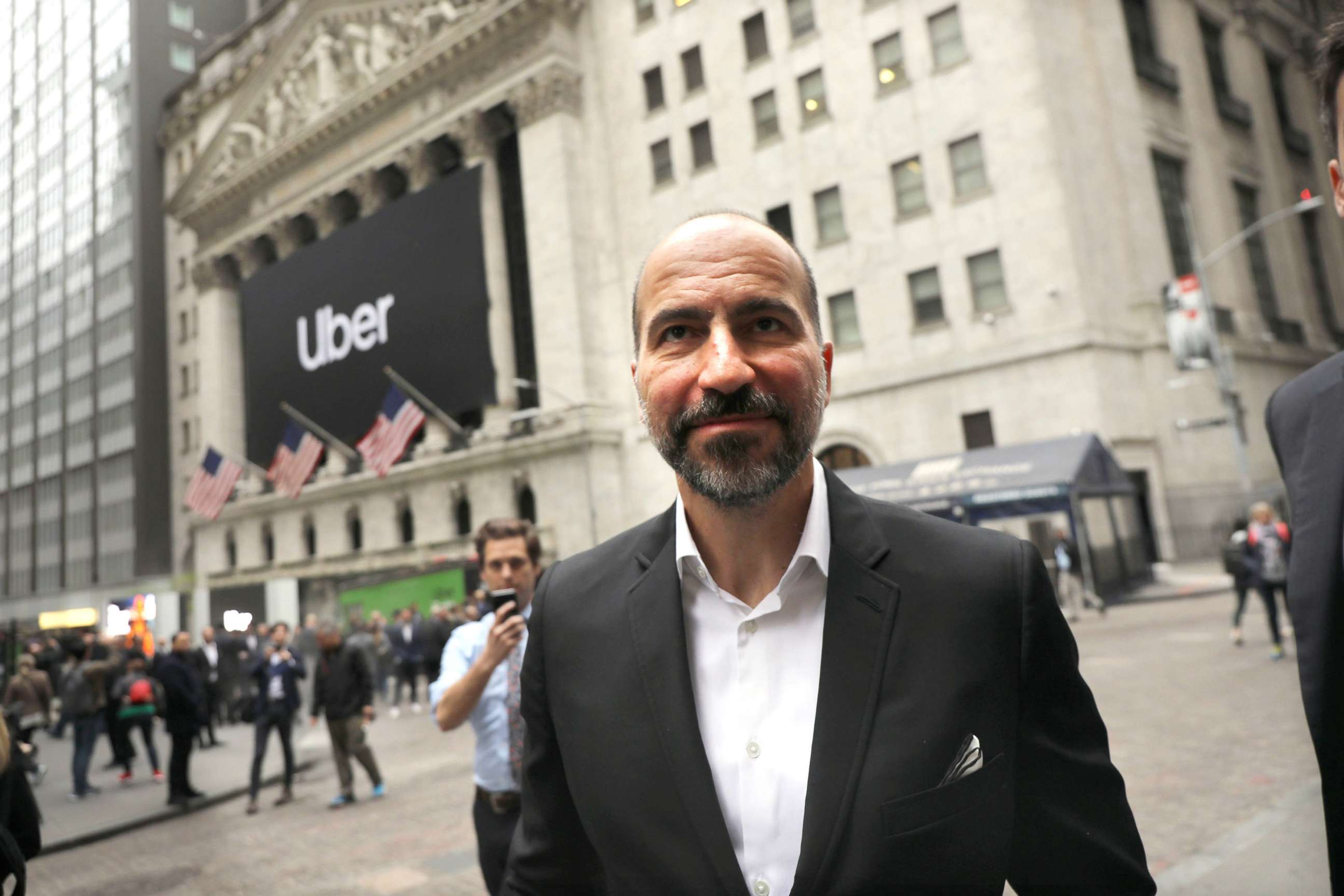 PHOTO: Uber CEO Dara Khosrowshahi walks outside of the New York Stock Exchange (NYSE) before ringing the Opening Bell at the NYSE as the ride-hailing company Uber makes its highly anticipated initial public offering (IPO) on May 10, 2019, in New York.