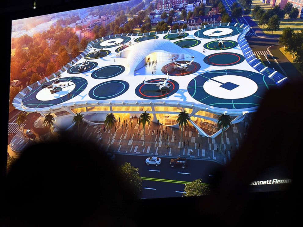 PHOTO: A concept illustration for skyports for electric flying taxis is displayed at the second annual Uber Elevate Summit, on May 8, 2018 at the Skirball Center in Los Angeles.