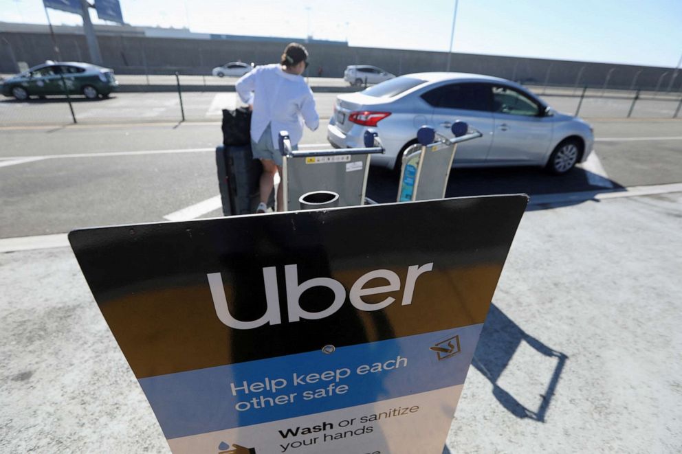 PHOTO: Uber signage is posted at Los Angeles International Airport (LAX) in Los Angeles, July 10, 2022.