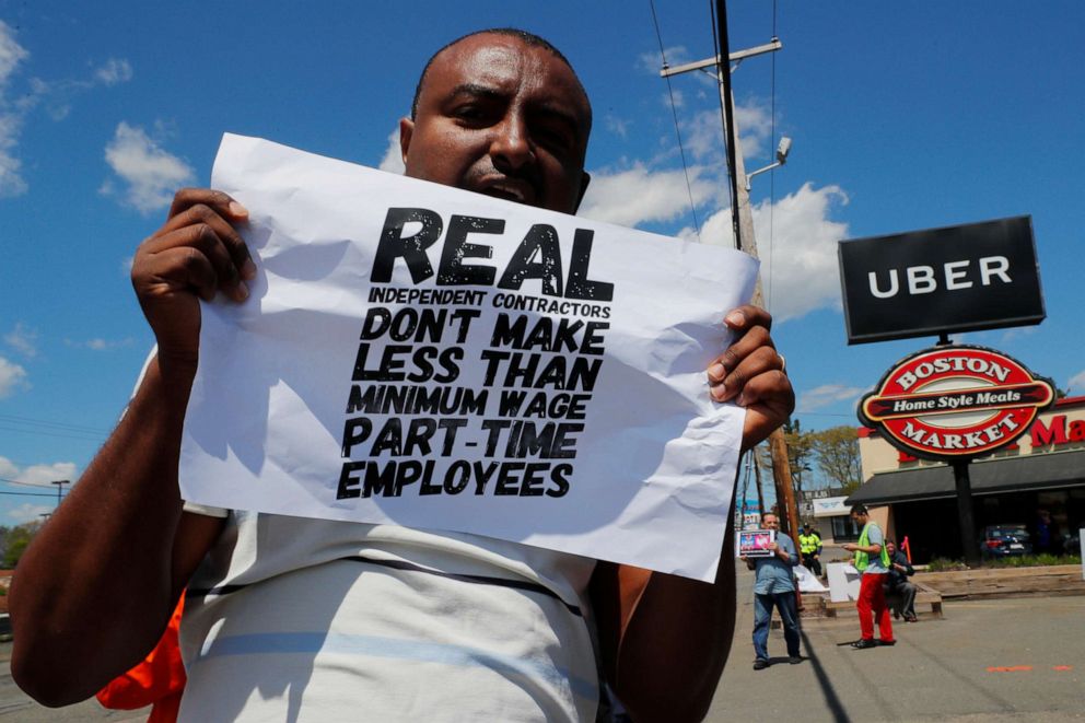 PHOTO: Uber and Lyft drivers protest during a day-long strike outside Uber's office in Saugus, Mass., May 8, 2019.