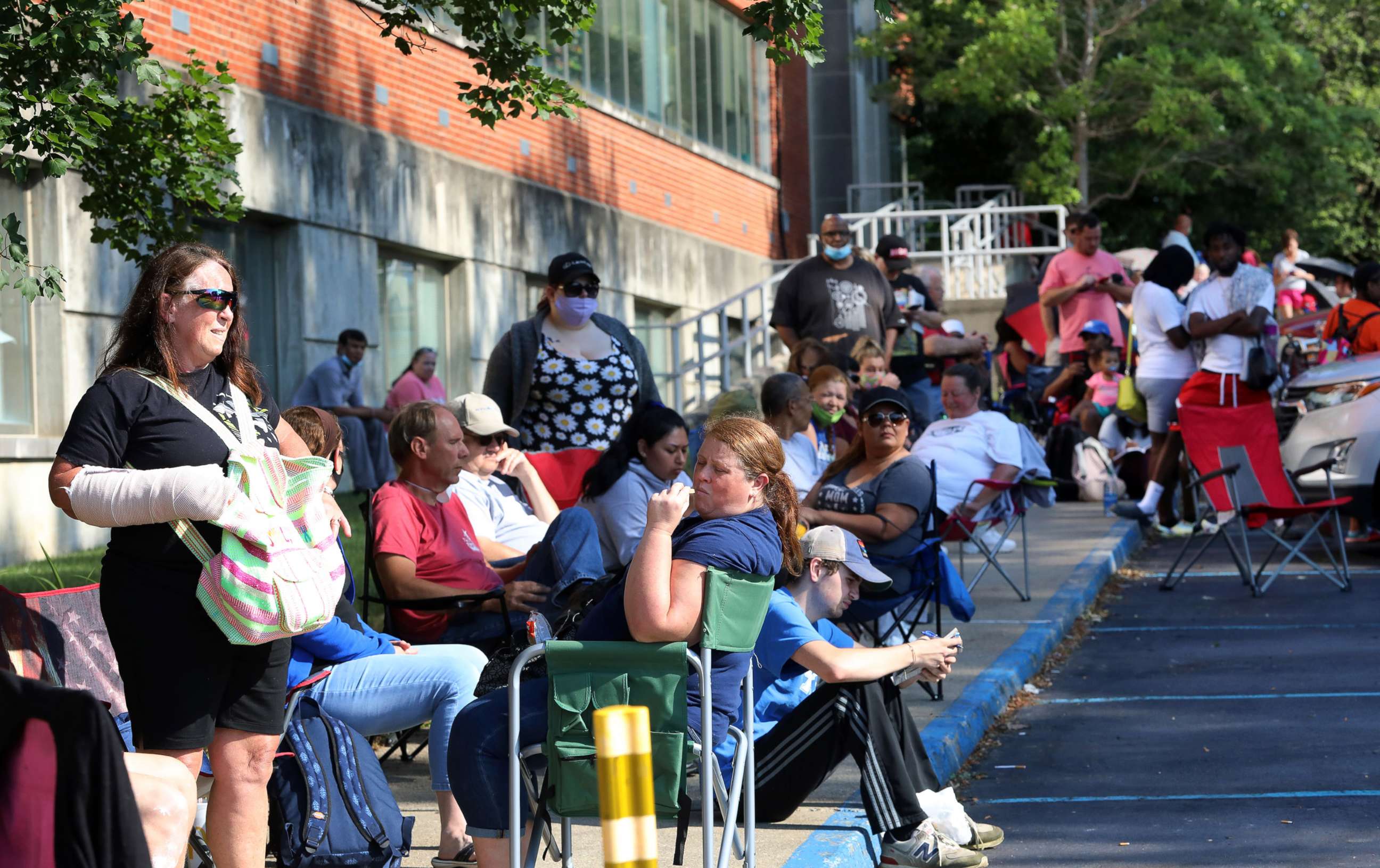 PHOTO: Hundreds of unemployed Kentucky residents wait in long lines outside the Kentucky Career Center for help with their unemployment claims, June 19, 2020, in Frankfort, Ky.