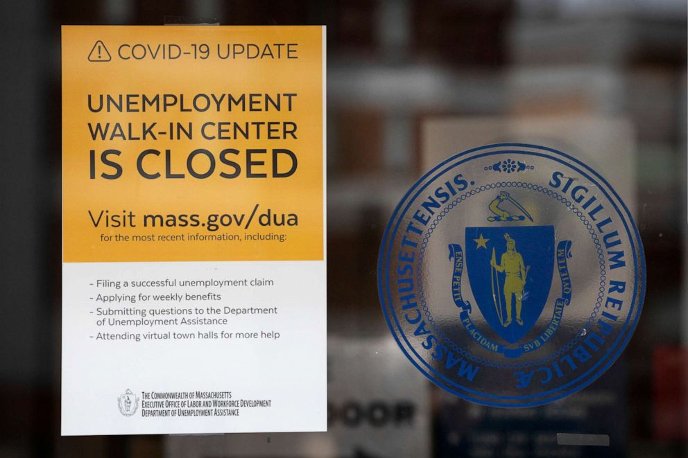 PHOTO: A sign announces the closure of the Massachusetts Unemployment Office, Saturday, May 9, 2020, in Boston.