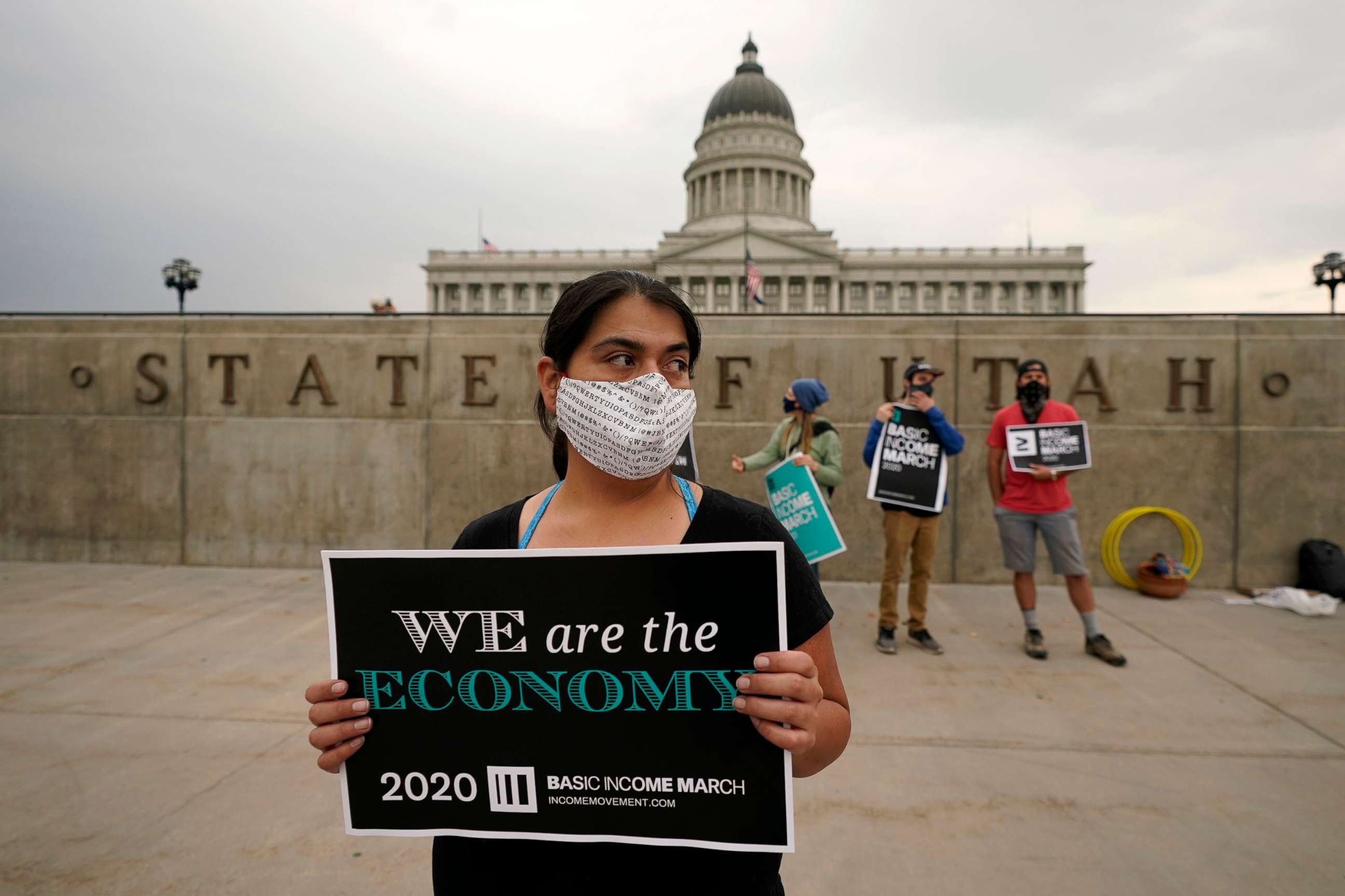 PHOTO:Brenda Milian gathers with other showing their support for the 2020 Basic Income March at the Utah State Capitol on Saturday, Sept. 19, 2020, in Salt Lake City.