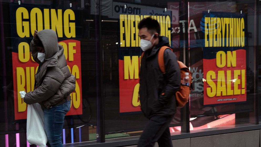 PHOTO: Sale signs are displayed in the window of a business on Dec. 01, 2020, in New York.