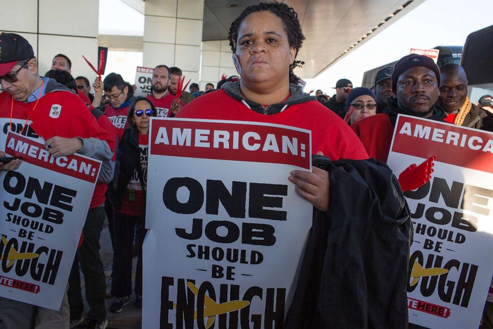 PHOTO: The labor union UNITE HERE holds a rally for American Airlines food caterers to demand health care for the workers at Terminal 8 at JFK Airport in New York, Nov. 26, 2019.