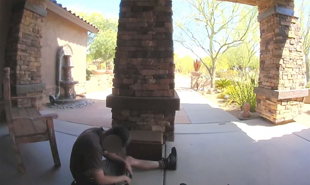 PHOTO: An image from a doorbell video shows a UPS delivery driver collapsing in the triple-digit heat, July 14, 2022, in Scottsdale, Ariz.