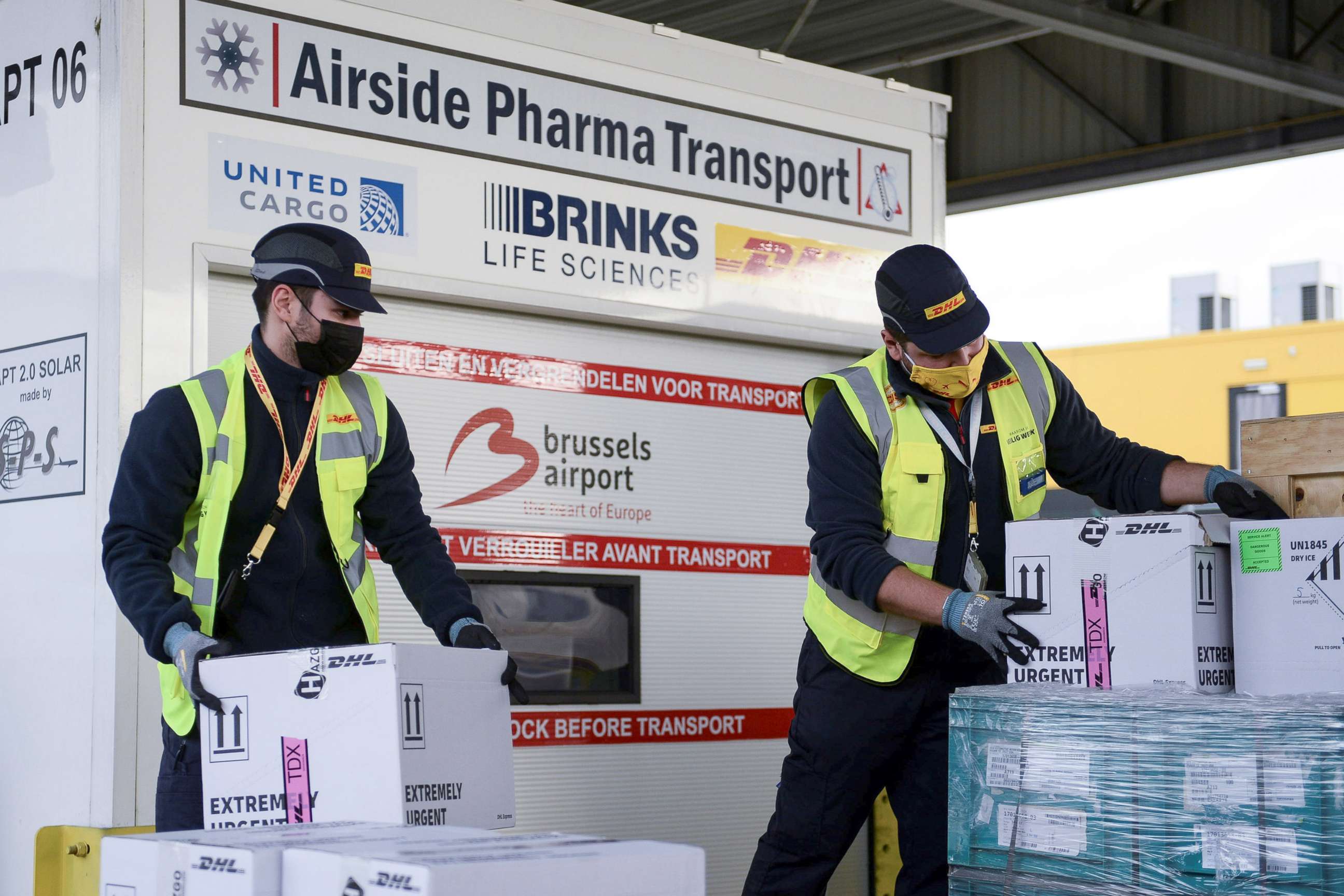PHOTO: Workers prepare cool boxes to be transported by airplane, as Brussels International Airport prepares to transport vaccines and vaccine candidates for the coronavirus disease on Dec. 1, 2020 in Brussels.
