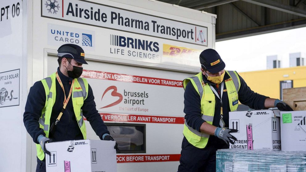 PHOTO: Workers prepare cool boxes to be transported by airplane, as Brussels International Airport prepares to transport vaccines and vaccine candidates for the coronavirus disease on Dec. 1, 2020 in Brussels.