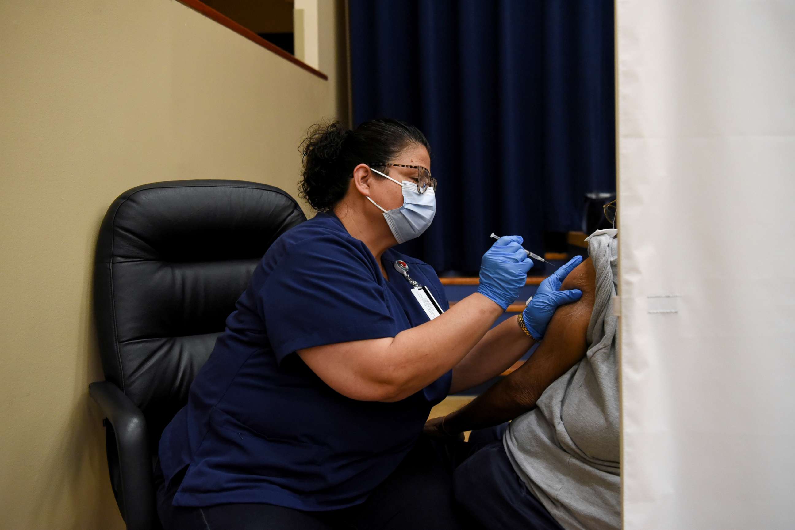 PHOTO: A healthcare workers administers a vaccine for the coronavirus disease at Acres Home Multi-Service Center in Houston, Oct. 13, 2021.