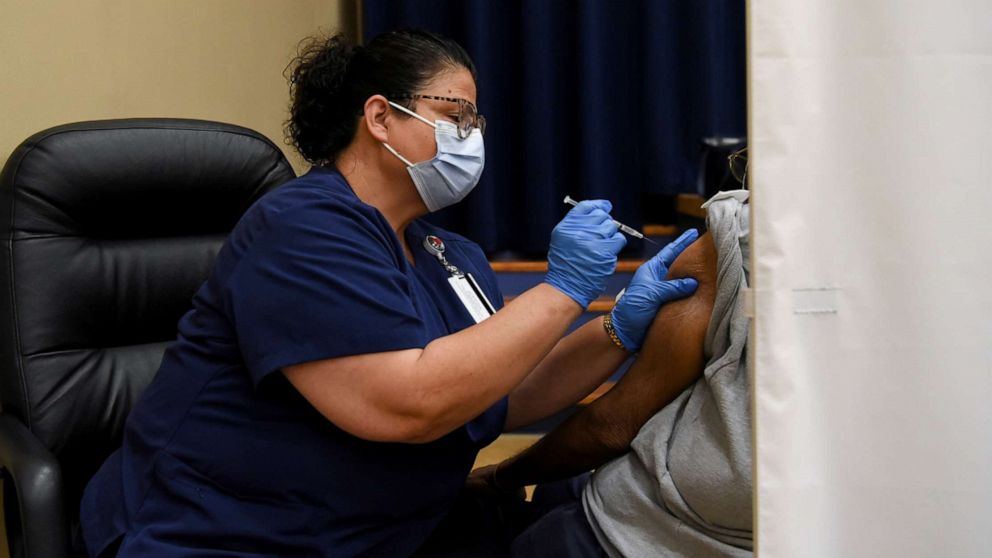 PHOTO: A healthcare workers administers a vaccine for the coronavirus disease at Acres Home Multi-Service Center in Houston, Oct. 13, 2021.